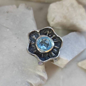 Silver Flower Ring with blue Topaz