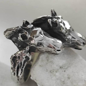 Silver ring with natural diamonds, in the shape of two horses